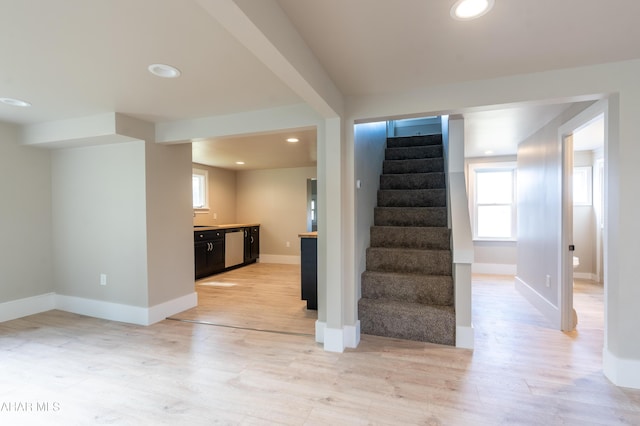 stairway featuring hardwood / wood-style flooring