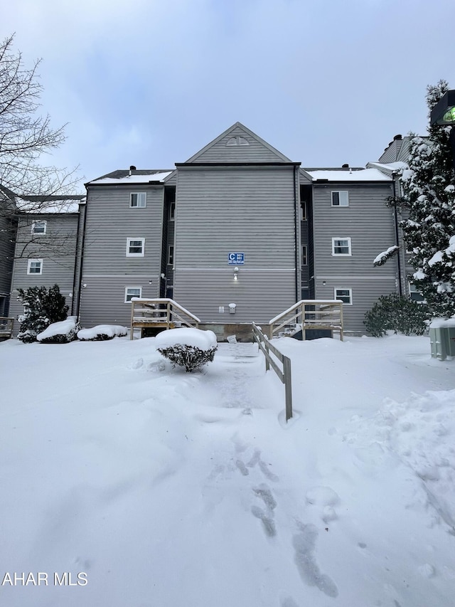 view of snow covered property