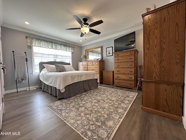 bedroom featuring dark wood-style flooring, multiple windows, and ornamental molding