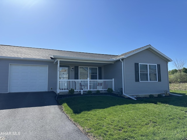 single story home with a shingled roof, an attached garage, aphalt driveway, a porch, and a front yard