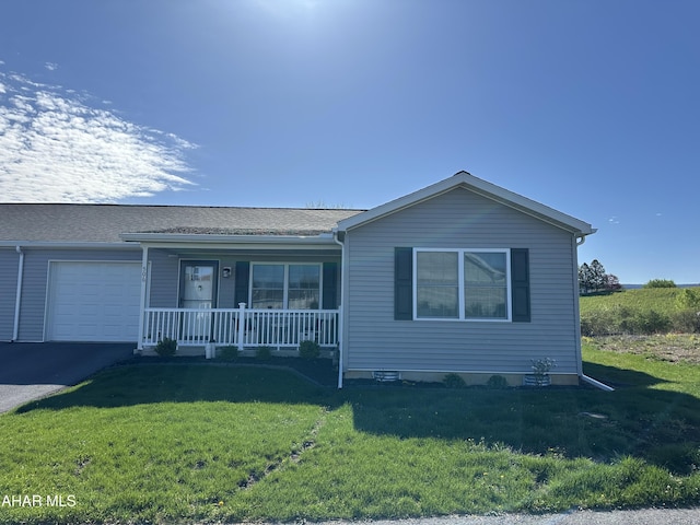 view of front of house featuring covered porch, driveway, roof with shingles, a front yard, and an attached garage