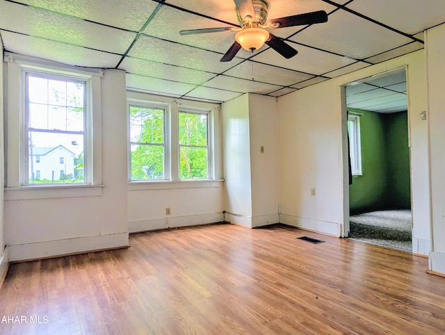 157 Cove Rd, Buffalo Mills, PA 15534 - empty room with plenty of natural light, light wood-style flooring, ceiling fan, and a drop ceiling