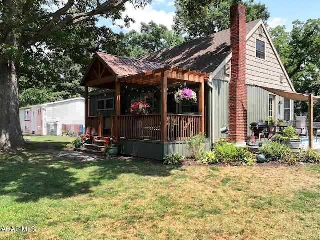 exterior space featuring a lawn