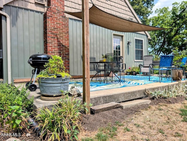 exterior space featuring grilling area and a deck