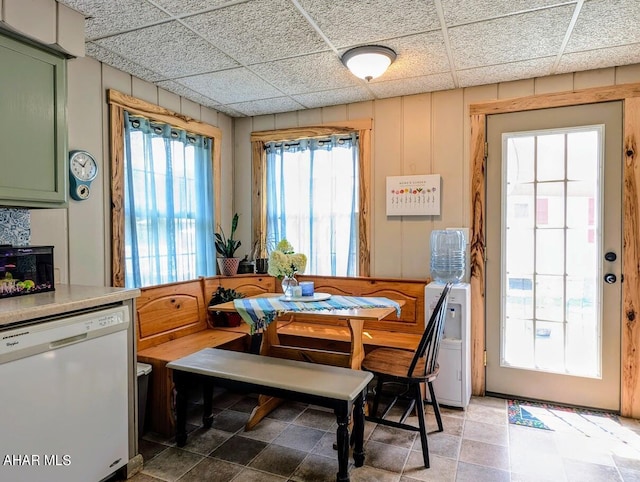 dining room with a paneled ceiling