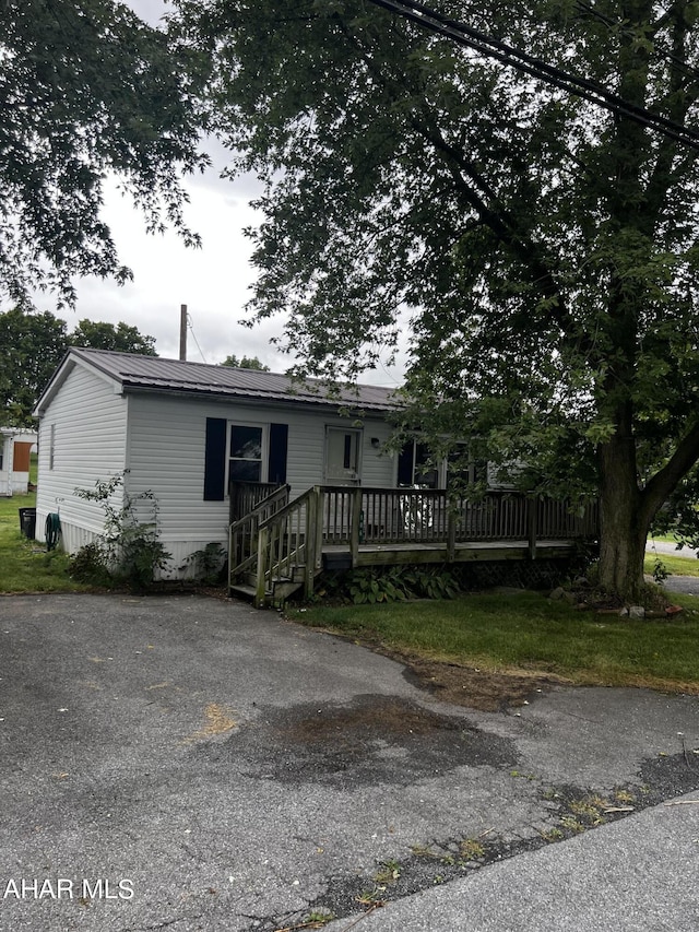 view of front of home with a deck