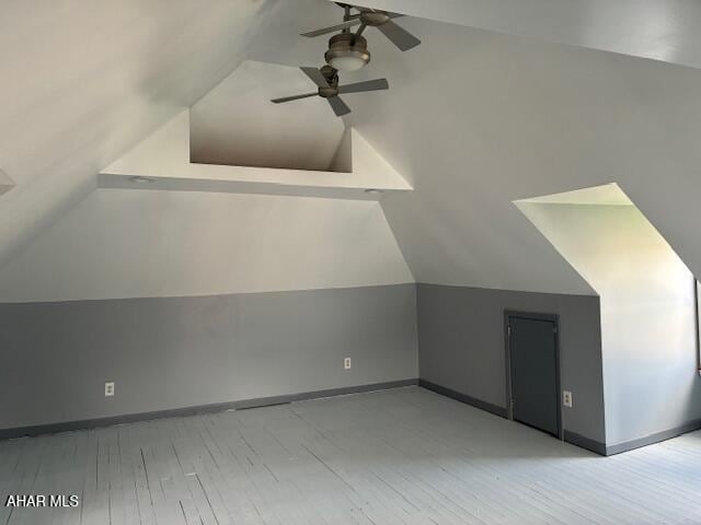 215 N 10th Ave, Altoona, PA 16601 - bonus room with lofted ceiling, a ceiling fan, and light wood-style floors
