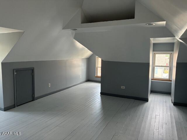 215 N 10th Ave, Altoona, PA 16601 - bonus room featuring vaulted ceiling and hardwood / wood-style floors