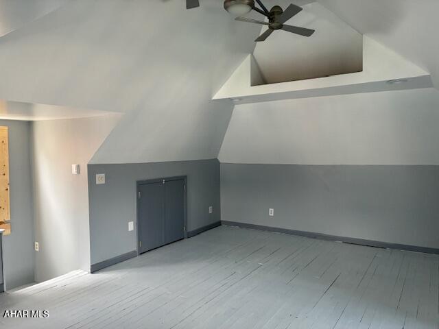 215 N 10th Ave, Altoona, PA 16601 - bonus room featuring ceiling fan, wood finished floors, and lofted ceiling