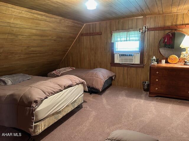5168 Black Log Rd, Orbisonia, PA 17243 - bedroom featuring carpet, cooling unit, wooden walls, and wooden ceiling