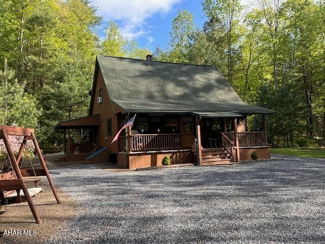 5168 Black Log Rd, Orbisonia, PA 17243 - rustic home featuring a porch and a shingled roof