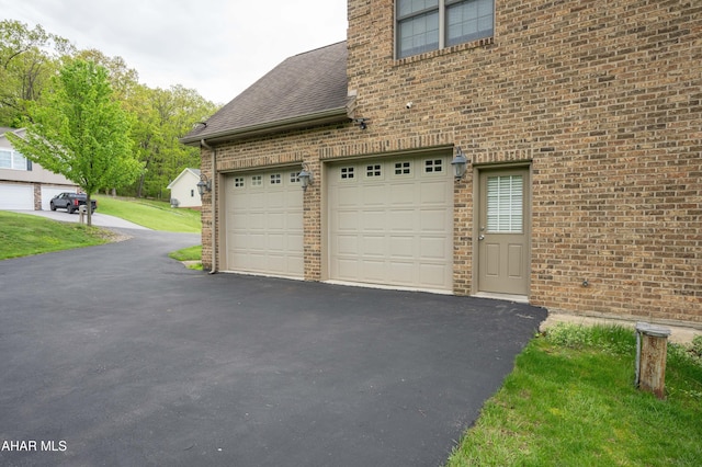 738 Chapel Dr, Altoona, PA 16602 - garage featuring asphalt driveway