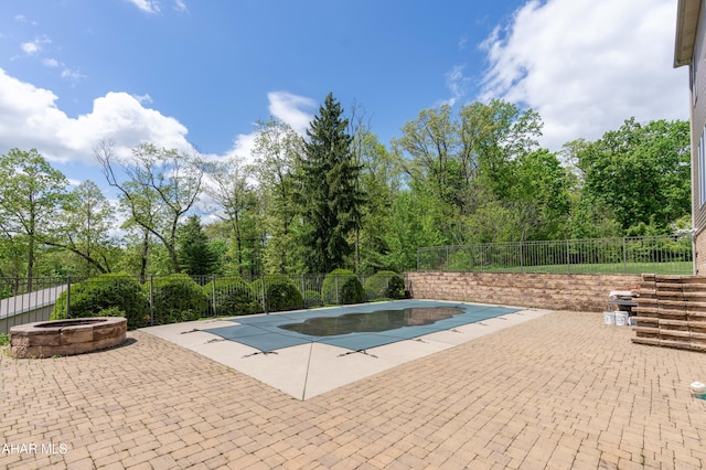 738 Chapel Dr, Altoona, PA 16602 - view of swimming pool featuring a fire pit, a patio area, and a fenced backyard