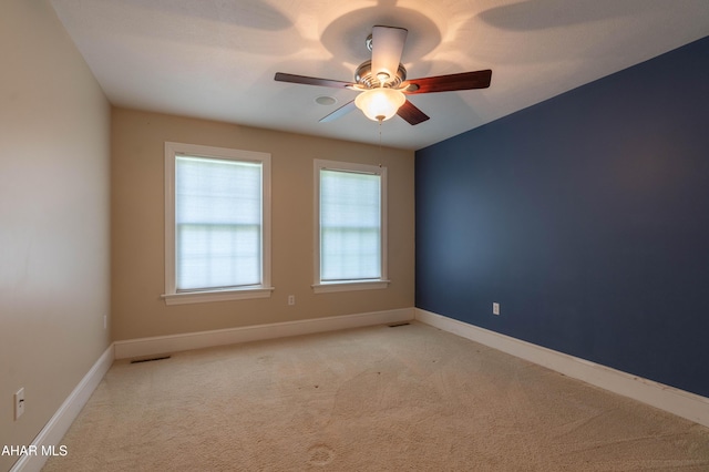 738 Chapel Dr, Altoona, PA 16602 - spare room with light carpet, a ceiling fan, and baseboards