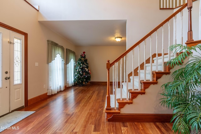 738 Chapel Dr, Altoona, PA 16602 - entryway with wood finished floors, stairs, and baseboards
