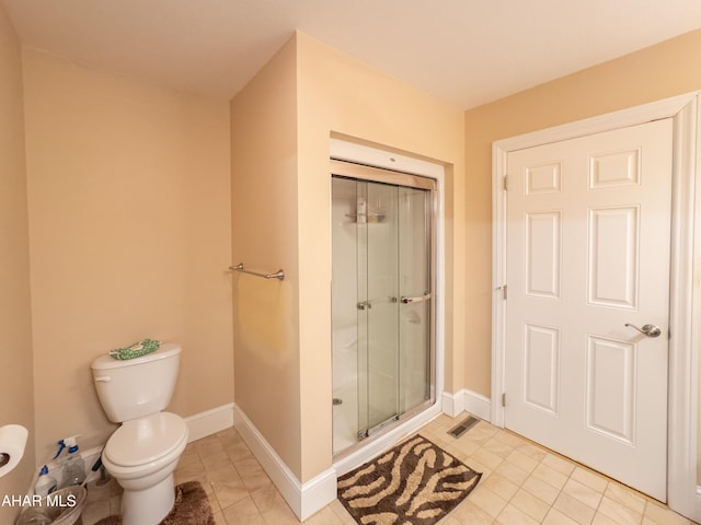 738 Chapel Dr, Altoona, PA 16602 - full bathroom featuring a shower stall, toilet, tile patterned flooring, and baseboards
