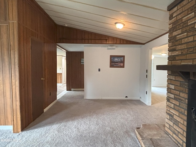 130 E 7th St, Coudersport, PA 16915 - unfurnished living room with lofted ceiling, carpet floors, and wood walls