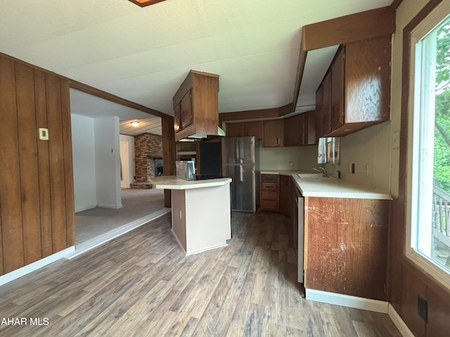 130 E 7th St, Coudersport, PA 16915 - kitchen with light countertops, light wood finished floors, plenty of natural light, and stainless steel appliances