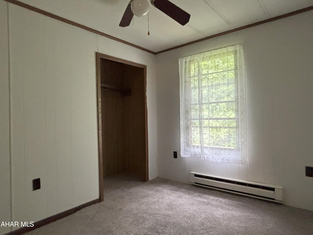 130 E 7th St, Coudersport, PA 16915 - unfurnished bedroom with baseboard heating, carpet, multiple windows, crown molding, and a ceiling fan