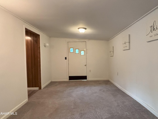 130 E 7th St, Coudersport, PA 16915 - carpeted entryway featuring crown molding and baseboards