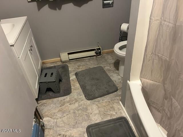 1004-08 17th Ave, Altoona, PA 16601 - bathroom featuring toilet, vanity, and a baseboard radiator