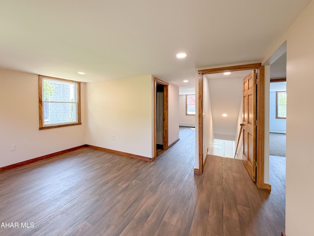 346 Lower Snake Spring Rd, Everett, PA 15537 - empty room with wood finished floors, recessed lighting, and a baseboard heating unit