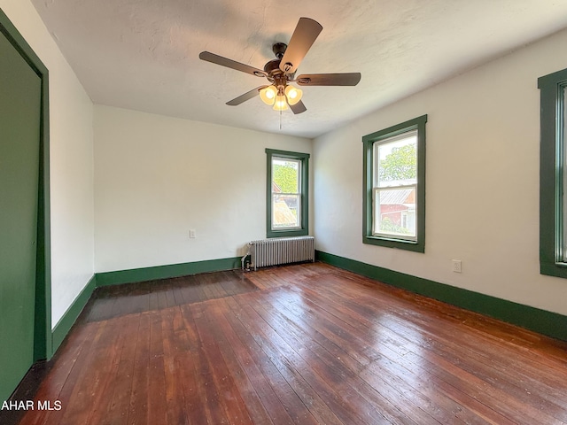 346 Lower Snake Spring Rd, Everett, PA 15537 - spare room with radiator, wood-type flooring, and a ceiling fan