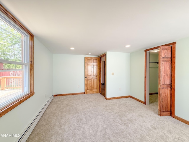346 Lower Snake Spring Rd, Everett, PA 15537 - empty room with baseboard heating, light carpet, healthy amount of natural light, and recessed lighting