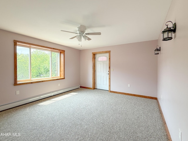 346 Lower Snake Spring Rd, Everett, PA 15537 - unfurnished room with a baseboard heating unit, light colored carpet, and a ceiling fan