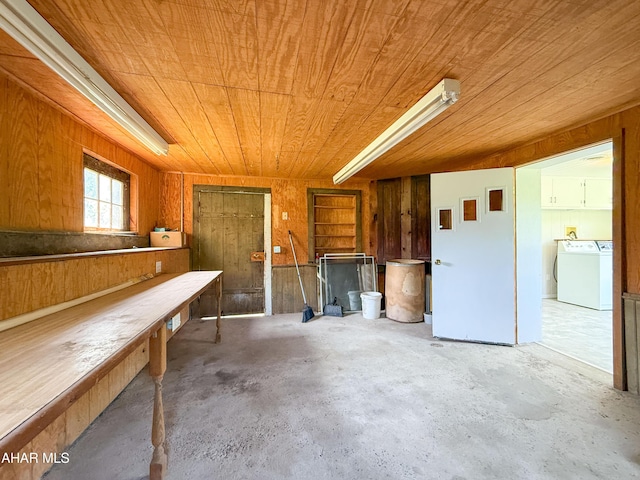 346 Lower Snake Spring Rd, Everett, PA 15537 - misc room featuring washer / clothes dryer, wooden ceiling, concrete flooring, and wooden walls