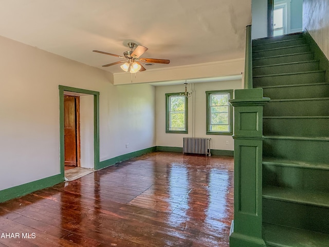 346 Lower Snake Spring Rd, Everett, PA 15537 - stairs with radiator heating unit, hardwood / wood-style flooring, and a ceiling fan