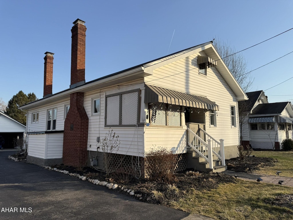 exterior space with a chimney