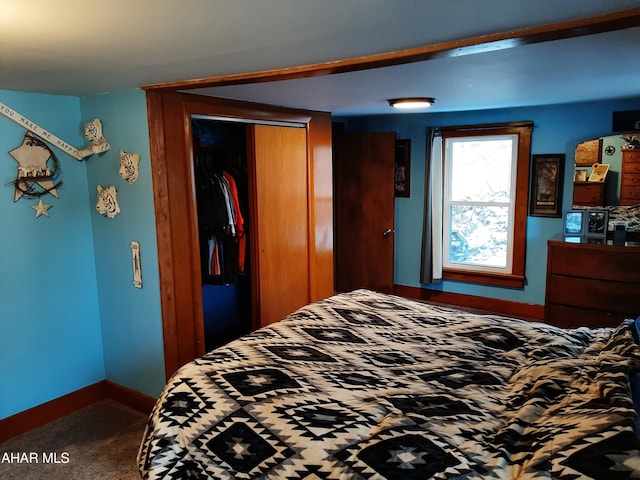 carpeted bedroom with a closet