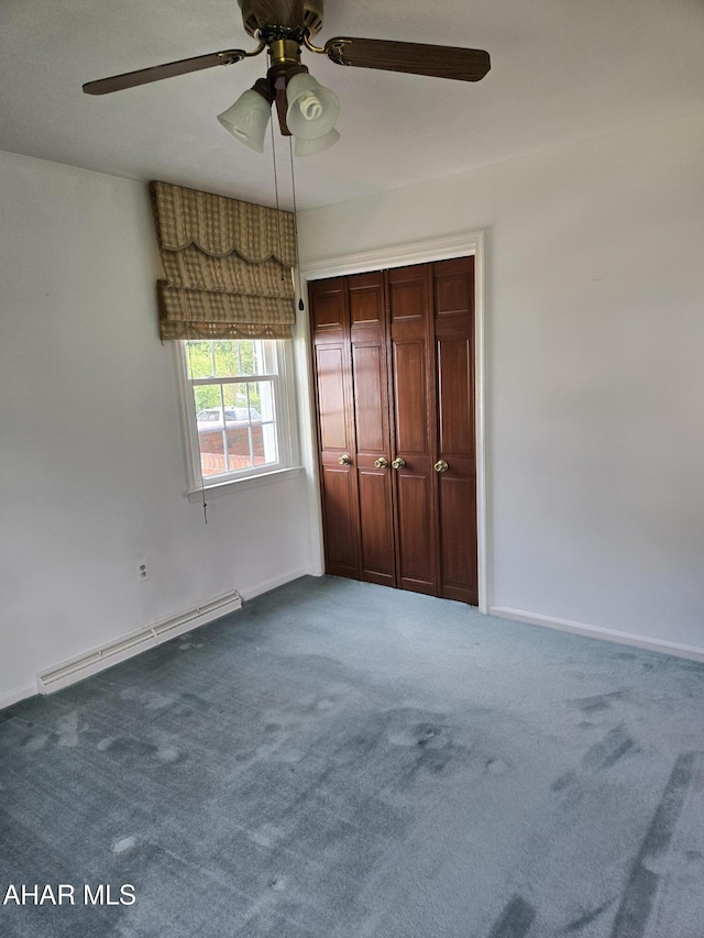 3576 Juniata Gap Rd, Altoona, PA 16601 - unfurnished bedroom featuring a baseboard radiator, carpet floors, a closet, and a ceiling fan