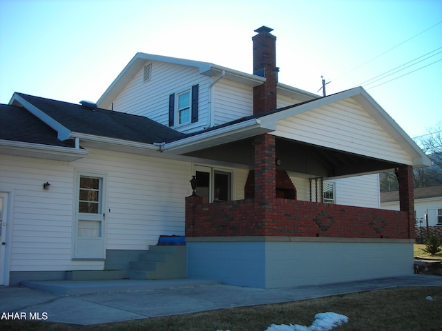 3576 Juniata Gap Rd, Altoona, PA 16601 - view of home's exterior featuring a chimney and a porch