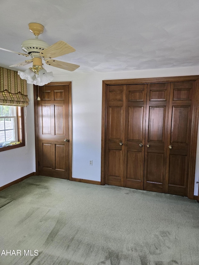 3576 Juniata Gap Rd, Altoona, PA 16601 - unfurnished bedroom with light colored carpet, a ceiling fan, and a closet