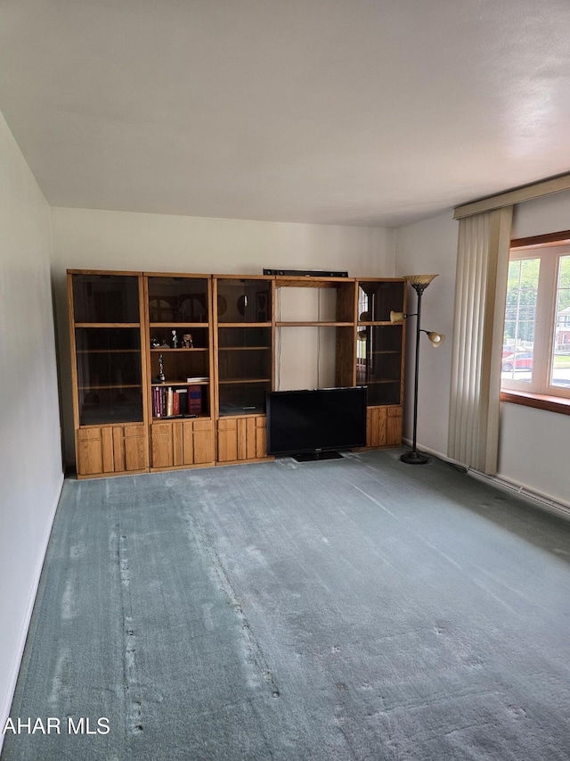 3576 Juniata Gap Rd, Altoona, PA 16601 - unfurnished living room with carpet flooring and baseboards