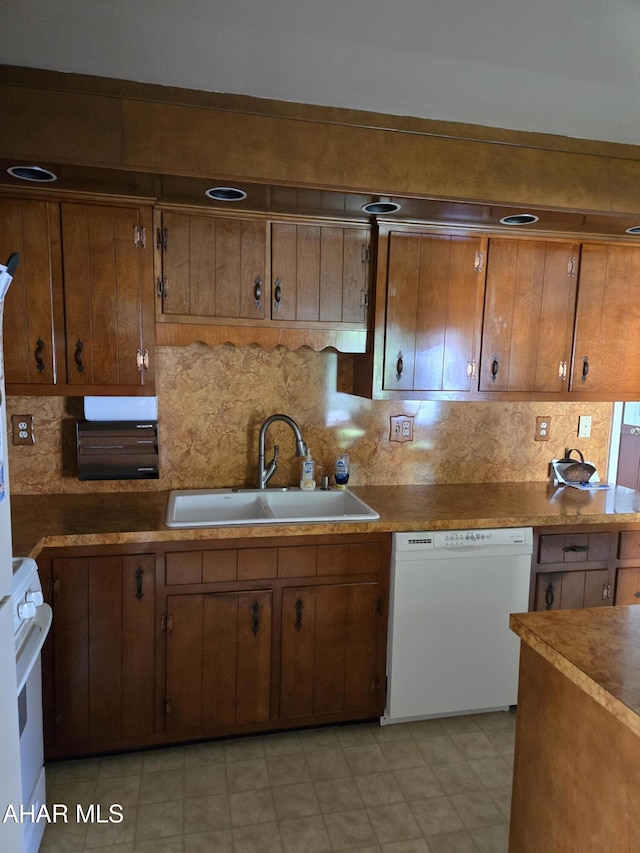 3576 Juniata Gap Rd, Altoona, PA 16601 - kitchen featuring white appliances, decorative backsplash, and brown cabinets