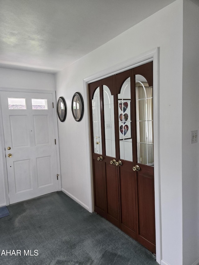 3576 Juniata Gap Rd, Altoona, PA 16601 - foyer with dark colored carpet and baseboards