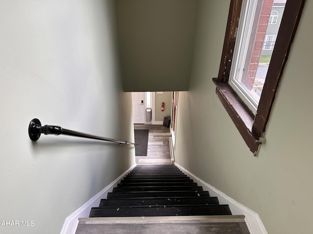 321 Main St, Gallitzin, PA 16641 - stairway with baseboards and wood finished floors