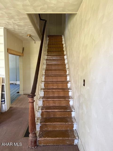 3091 Colonial Dr, Duncansville, PA 16635 - staircase with carpet floors
