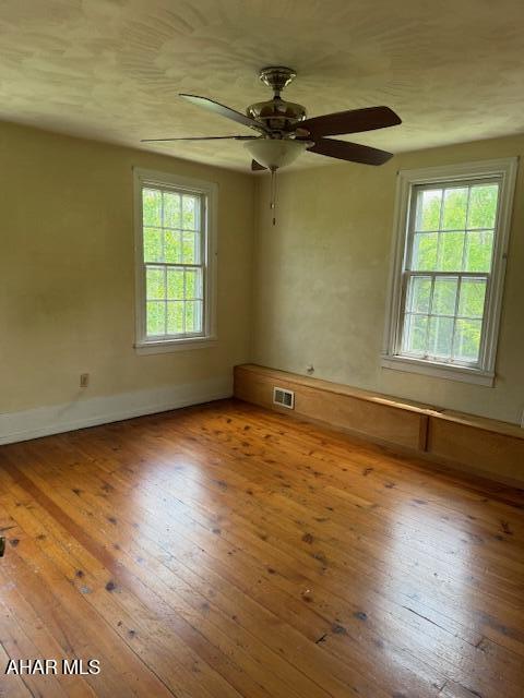 3091 Colonial Dr, Duncansville, PA 16635 - spare room with wood-type flooring, ceiling fan, and baseboards