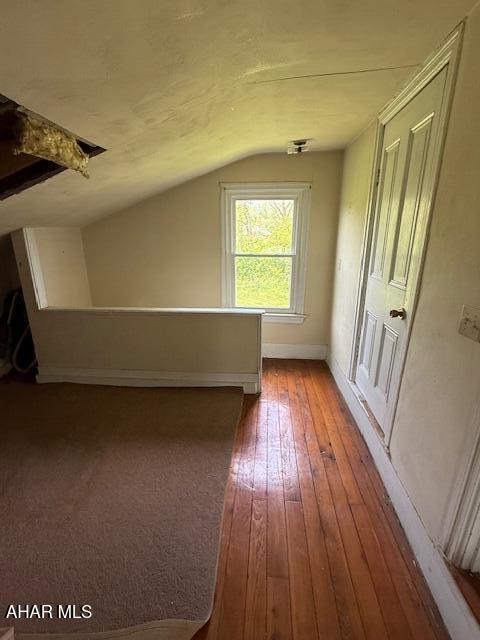 3091 Colonial Dr, Duncansville, PA 16635 - bonus room with lofted ceiling, light wood finished floors, and baseboards