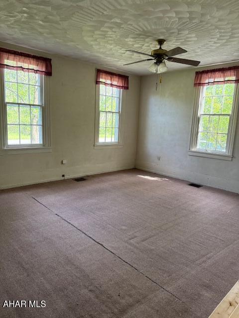3091 Colonial Dr, Duncansville, PA 16635 - unfurnished room with a ceiling fan and carpet floors