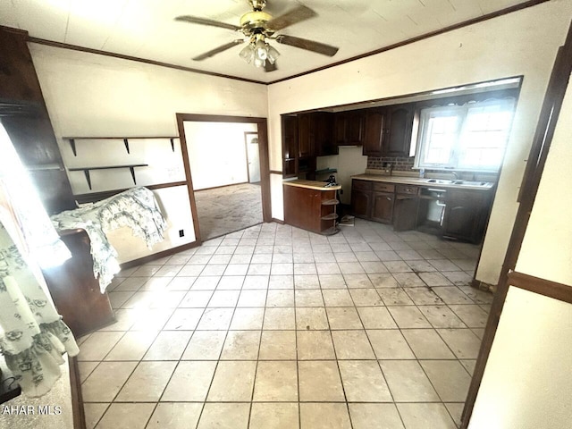 kitchen featuring dark brown cabinetry, ceiling fan, tasteful backsplash, light tile patterned floors, and ornamental molding