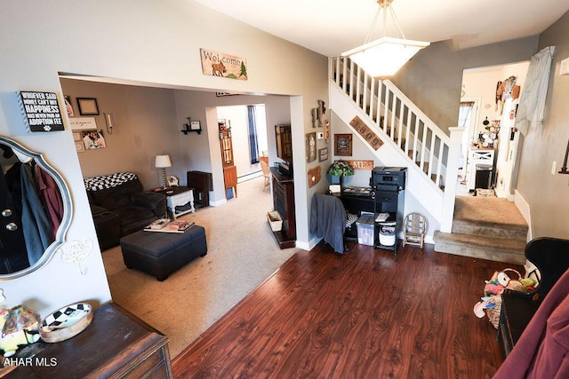 1809 5th St, Altoona, PA 16601 - living area with stairway, wood finished floors, a baseboard heating unit, and baseboards