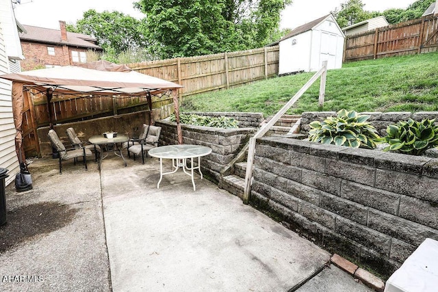 1809 5th St, Altoona, PA 16601 - view of patio featuring a storage shed, an outbuilding, and a gazebo