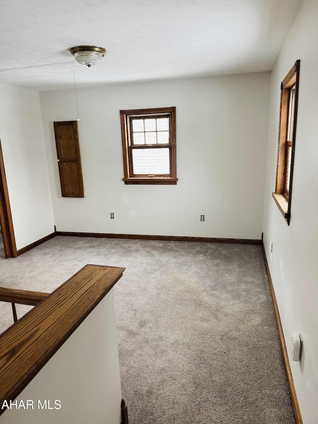 empty room with carpet floors