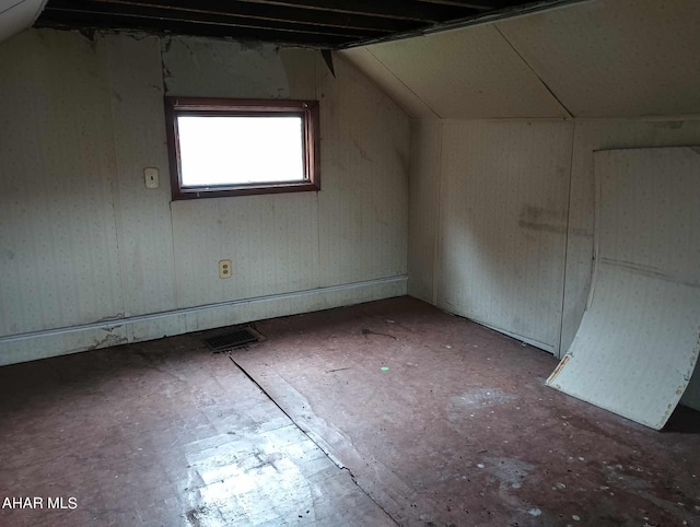 bonus room featuring vaulted ceiling