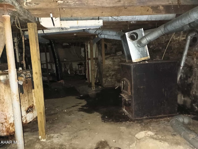 basement featuring heating unit